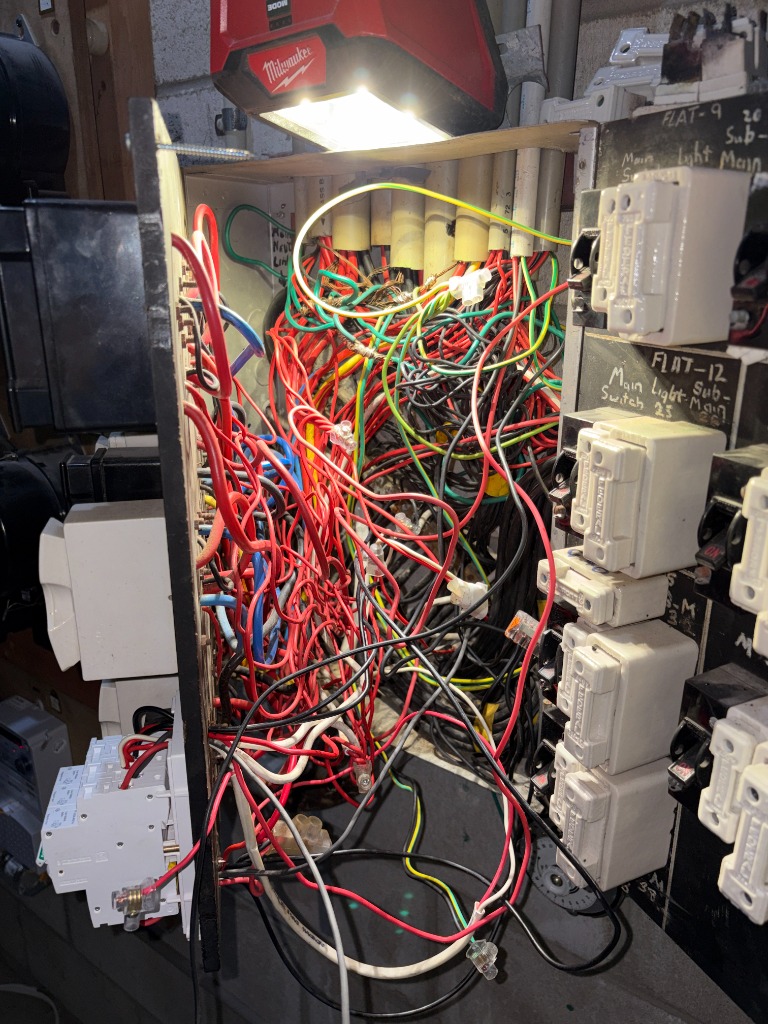 Switchboard rewiring with new safety switches and circuit isolation in progress